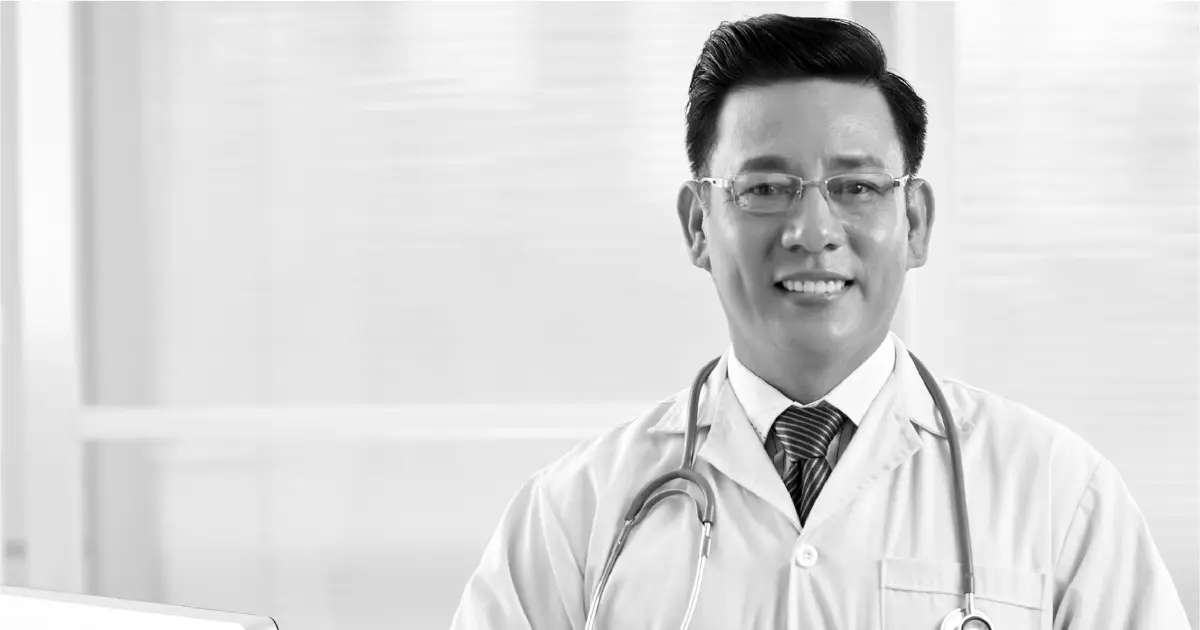 Doctor with a stethoscope, representing professional healthcare services and the importance of healthcare website design for medical practices.